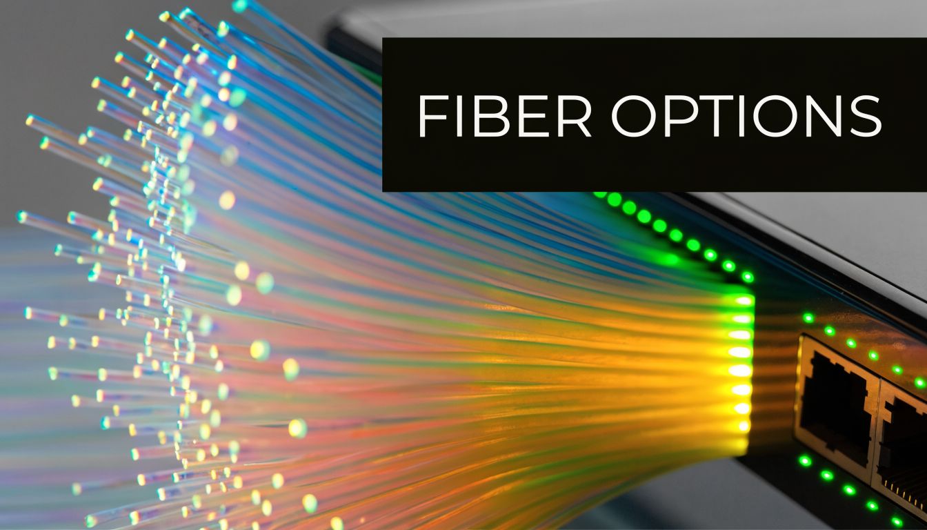 A cluster of glowing fiber optic cables connected to a network switch with green status lights.